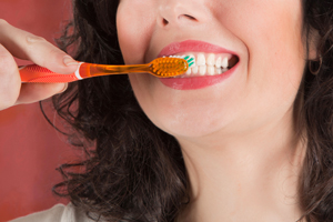 Woman Brushing Her Teeth